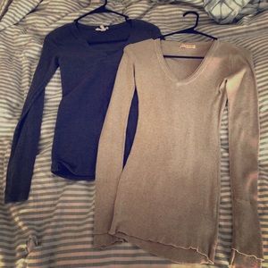 Two long sleeve shirts